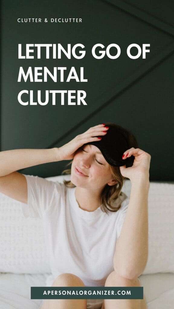 A smiling woman sits on a bed in a white shirt, lifting a black sleep mask from her eyes. The text reads, “Letting Go of Mental Clutter” with a website link, on a dark green background—perfect for those seeking tips on organizing their minds.