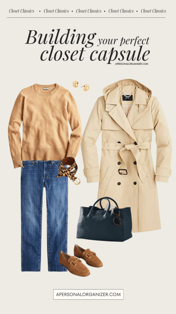 Flat lay of a women’s closet capsule wardrobe outfit featuring a beige sweater, blue jeans, trench coat, brown loafers, gold earrings, brown watch, tortoiseshell sunglasses, and a dark green tote bag.