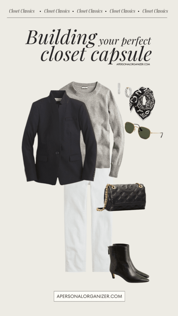 Flat lay of a minimalist closet capsule outfit featuring a black blazer, gray sweater, white pants, black ankle boots, quilted purse, sunglasses, silver bracelet, and a black-and-white scarf.