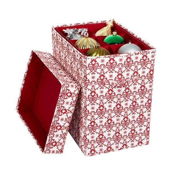 A red and white patterned storage box with a removable lid helps you organize your holiday decorations, holding colorful Christmas ornaments like gold, green, and silver balls, plus a small wrapped gift inside.