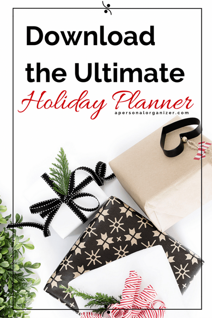 An arrangement of wrapped holiday gifts with decorative foliage is shown. The text reads, "Download the Ultimate Planner" with "Holiday Planner" written in red cursive. A URL at the bottom is specified as "apersonalorganizer.com".
