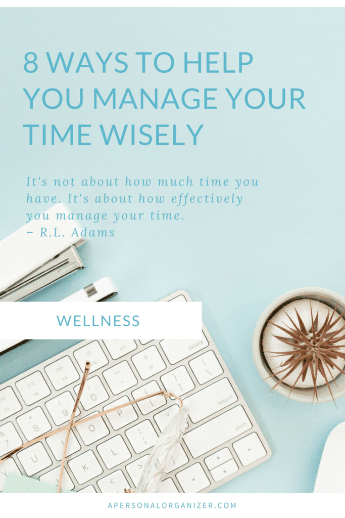 Image of a flat lay workspace with office supplies including a keyboard, a pen, a planner, a notebook, and a cup of coffee. Text on the image reads: "8 Ways to Help You Manage Your Time Wisely. It's not about how much time you have. It's about how effectively you manage your time. — R.L. Adams." Below is a "Wellness" label and at
