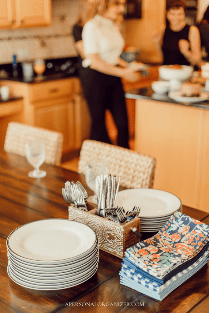 Setting a table for a brunch.