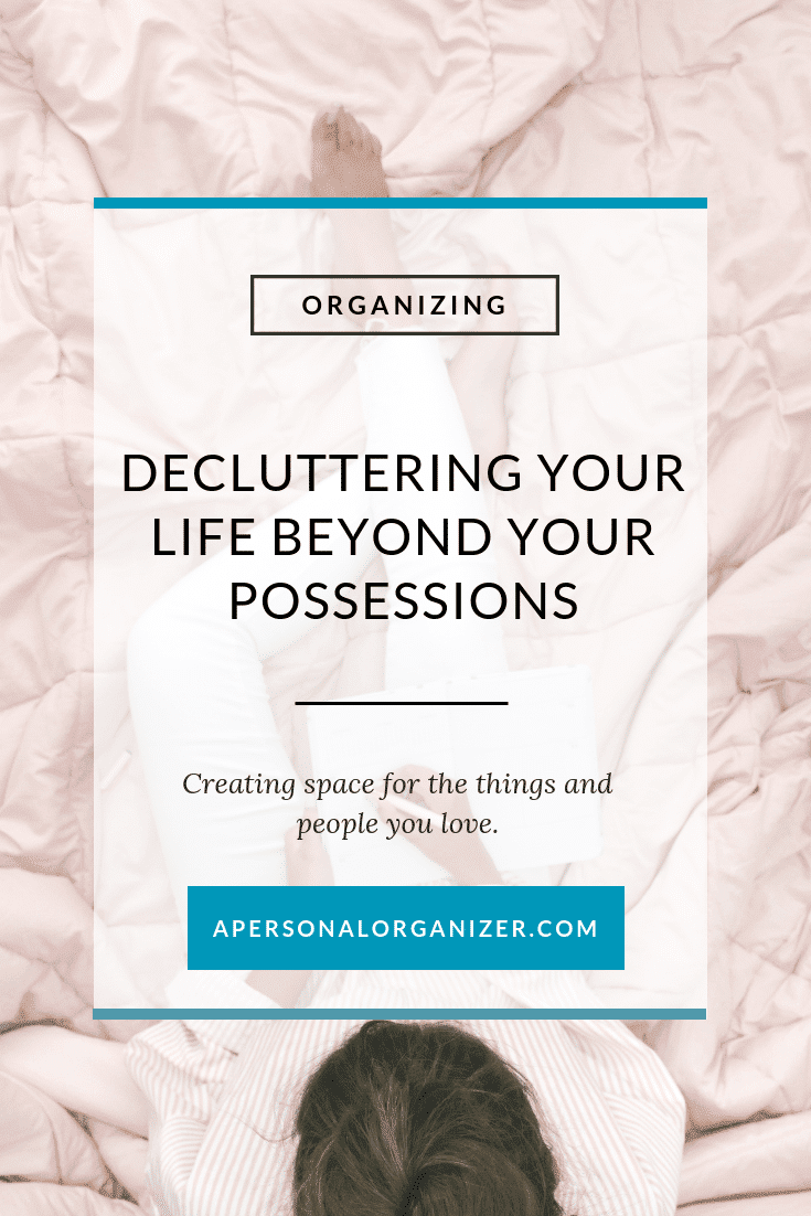 A person sitting on a rumpled bed, holding a tablet. The overlaid text promotes organizing and decluttering your personal life beyond physical possessions, encouraging creating space for loved ones and cherished activities. The website "apersonalorganizer.com" is displayed.