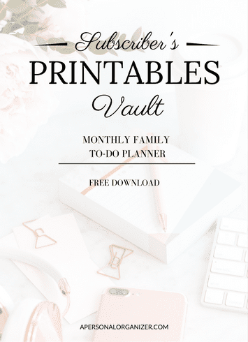 Elegant promotional graphic reading "Subscriber's Printables Vault: Monthly Family To-Do Planner, Free Download" with pink office supplies, a keyboard, and planner items on a white desk—perfect for organizing with stylish free printables.