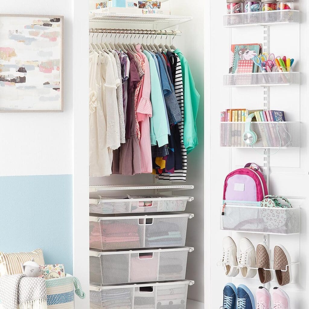 A neatly organized closet with clothes hanging on a rod, mesh drawers with folded items, shoes arranged at the bottom, and door racks holding school supplies, notebooks, and two backpacks showcases smart organizing and zero clutter.