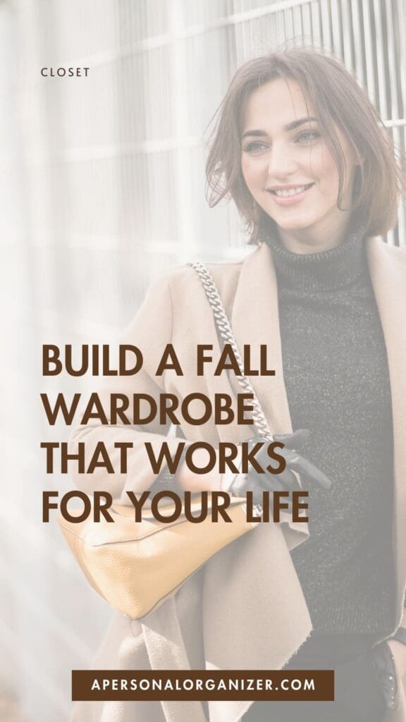 A smiling woman in a black turtleneck and tan coat holds a large yellow handbag. Overlaid text reads: "Build a fall wardrobe that works for your life," plus "Fall Outfit Ideas" at apersonalorganizer.com.