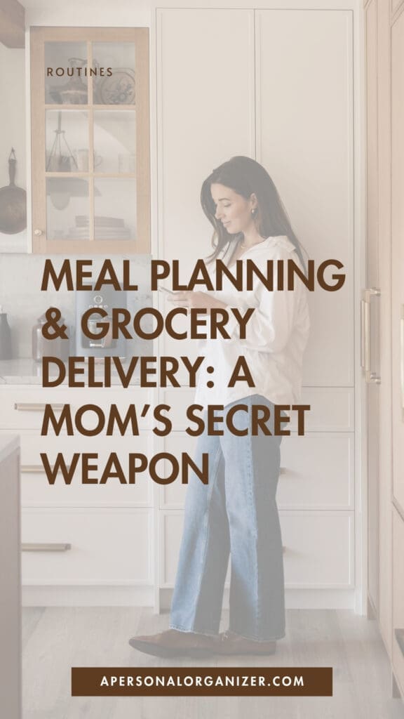 A woman stands in a modern kitchen using her phone. Overlaid text reads: "Meal Planning & Grocery Delivery: A Mom’s Secret Weapon—time saving hacks for moms." At the bottom is the website apersonalorganizer.com.