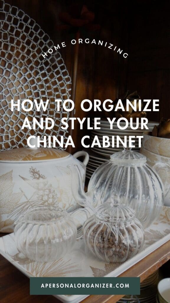 A china cabinet displaying glass and porcelain dishes, teapots, and decorative bowls, with text overlay: "How to organize and style your china cabinet" and "apersonalorganizer.com".