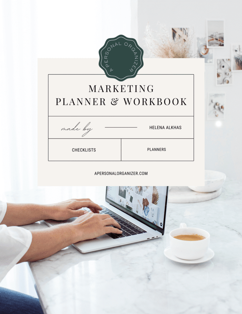 A person types on a laptop at a bright, organized desk with coffee, a notebook, and decorative plants. An overlaid graphic displays "Marketing Planner & Workbook" by Helena Alkhas—perfect for declutter and tidying your marketing strategy.