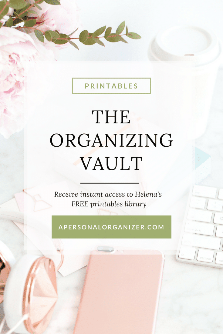 An image of organizational materials including a smartphone, a keyboard, a coffee cup, and rose gold stationery on a white marble desk. Text overlay reads: "PRINTABLES, THE ORGANIZING VAULT. Receive instant access to Helena's FREE printables library at apersonalorganizer.com.