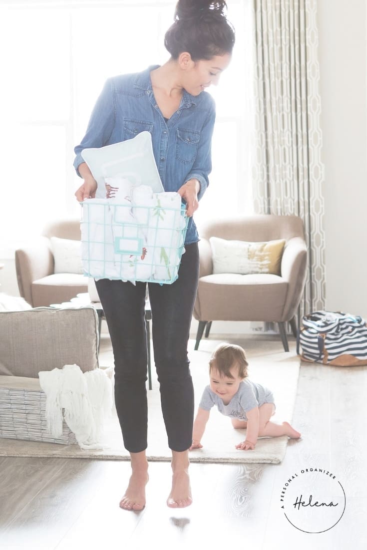 mother doing the laundry with baby