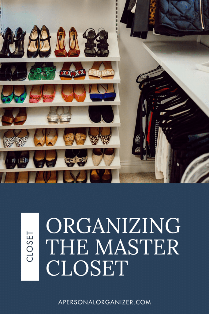 organized master closet with the Elfa closet system by the Container Store
