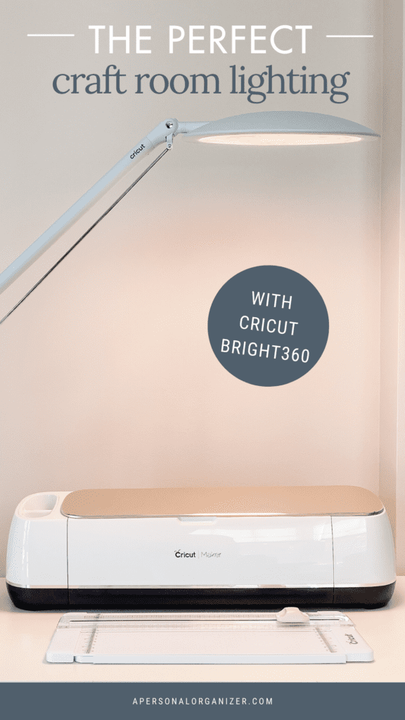 A crafting desk with a Cricut Maker and mat, illuminated by a Cricut Bright360 lamp, makes the perfect home office setup. Text reads, "The perfect craft room lighting with Cricut Bright360.